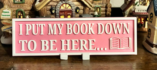 I Put My Book Down To Be Here sign