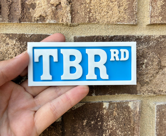 TBR bookshelf street sign
