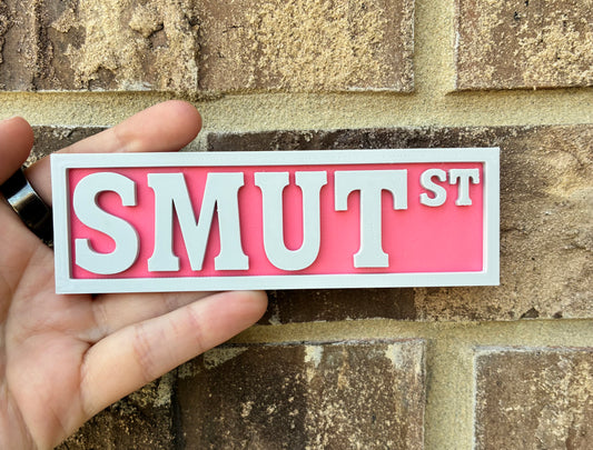 Smut bookshelf street sign