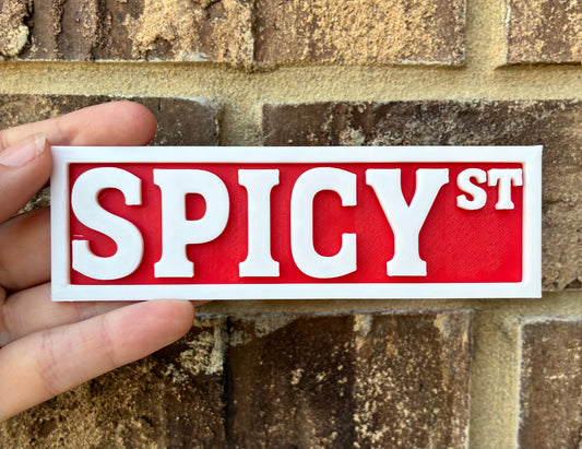 Spicy bookshelf street sign