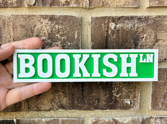 Bookish bookshelf street sign