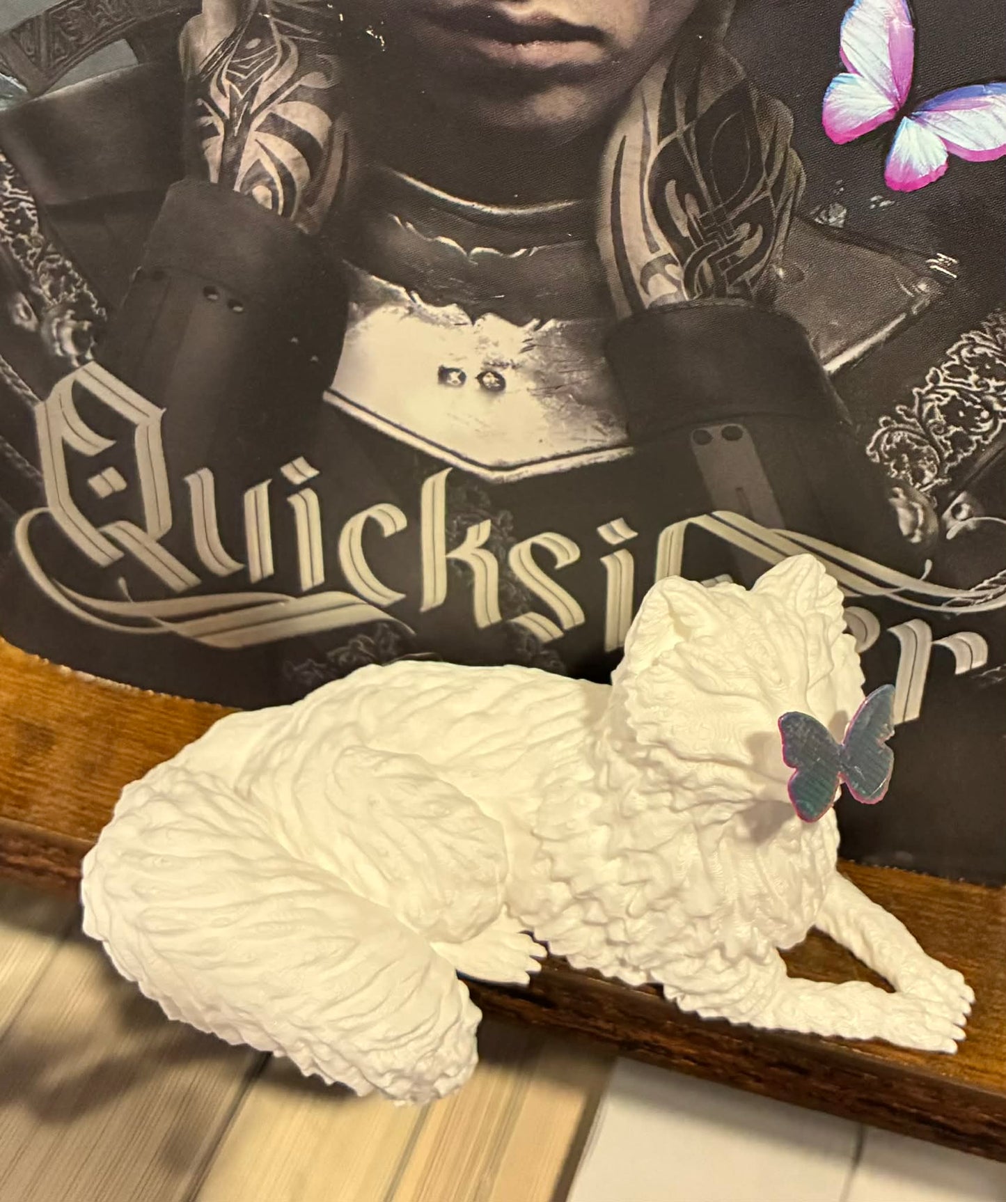 Arctic fox with butterfly